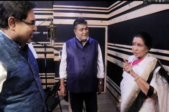 Asha Bhosle and Amit Kumar record Bengali Pujor Gaan composed by Shiladitya–Raj